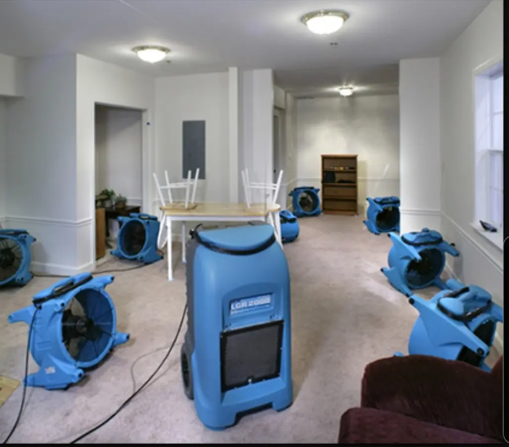Air movers and dehumidifier setup for Water Damage Restoration in Herriman